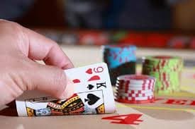 lapakqq Texas Poker multi-player table interface showing hole cards, community cards, and betting action